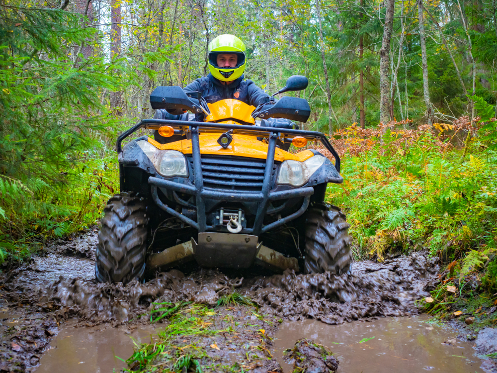 ATV in the forest in mud